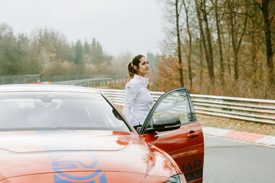 Célia Martin gets into the Jaguar RACE Taxi at the Nürburgring