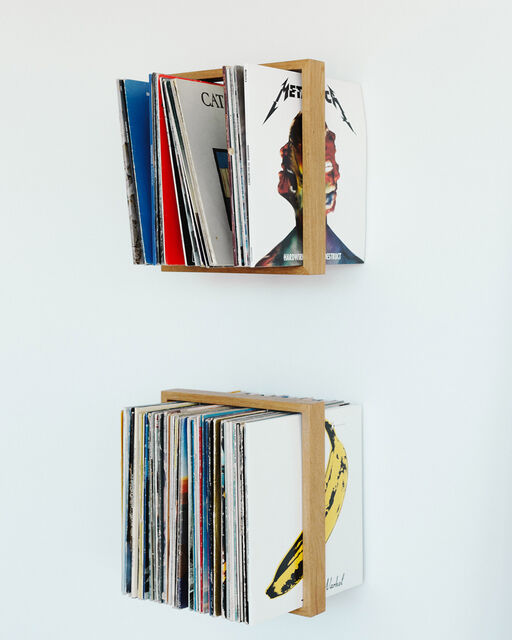 Modern wall shelf with records