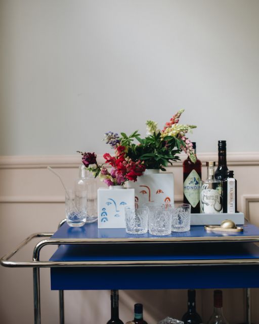 Serving trolley in blue with glasses