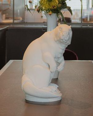 Porcelain beaver stands on table in restaurant of KPM Hotel & Residences in Berlin