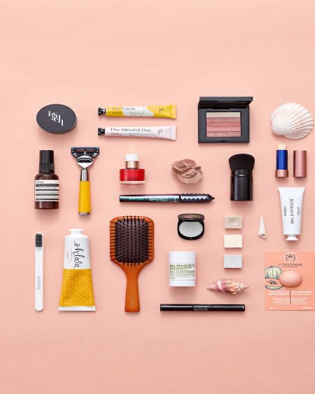 Cosmetics and care products on an orange background