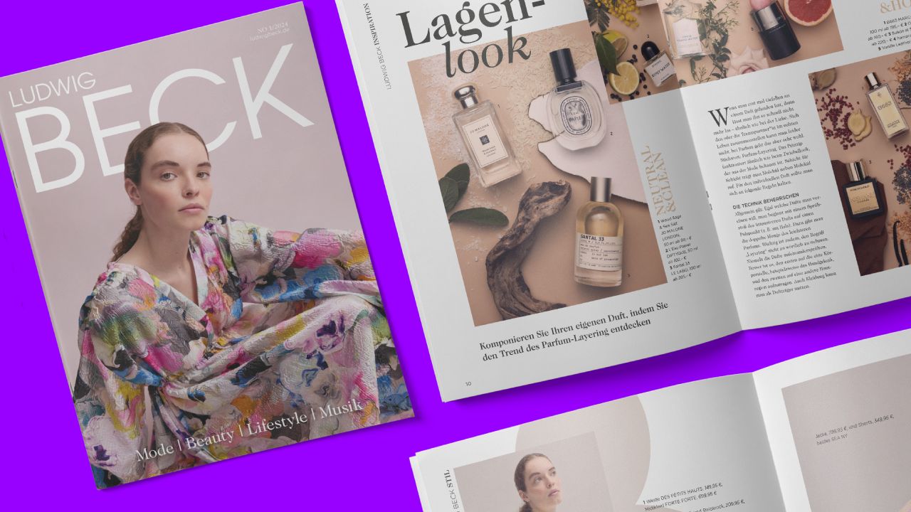Cover of issue 01/2024 of Ludwig Beck magazine and an open page on the topic of “layered look” (perfume layering) on a purple background