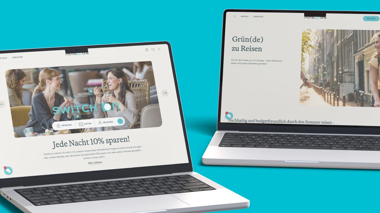 Two laptops on a blue background display the Motel One website with various articles and campaigns