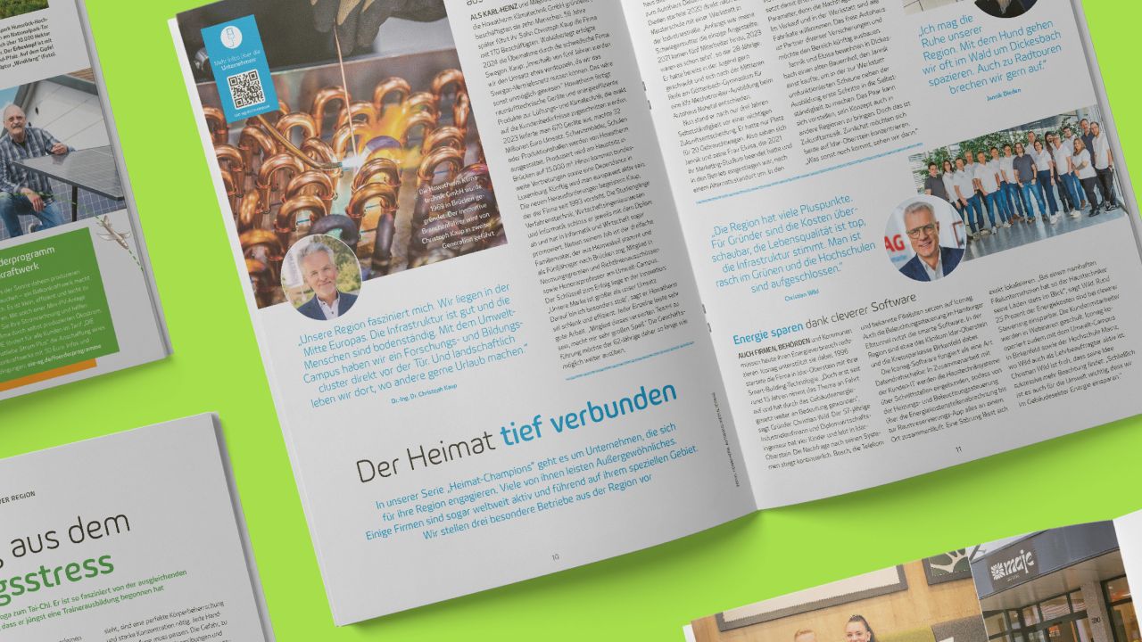 An open double-page spread of the print customer magazine "Meine OIE" with the German headline "Der Heimat tief verbunden".